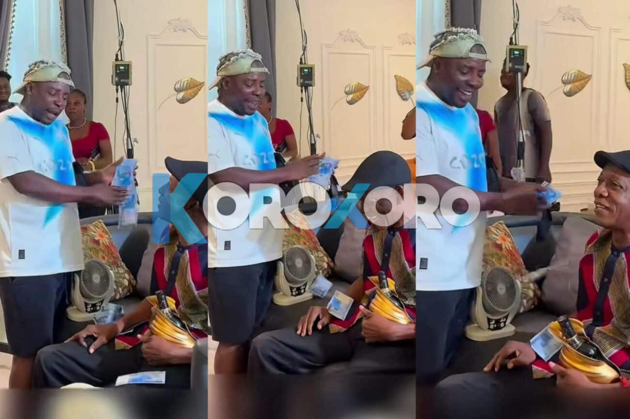 Mr Aloy Showers Nollywood Icon Nkem Owoh With Money and Palm Wine on Movie Set – Fans in Awe