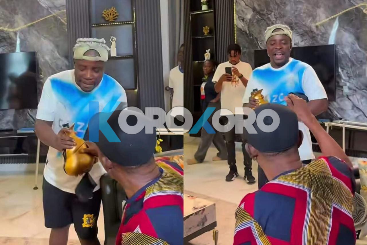 Mr Aloy Showers Nollywood Icon Nkem Owoh With Money and Palm Wine on Movie Set – Fans in Awe