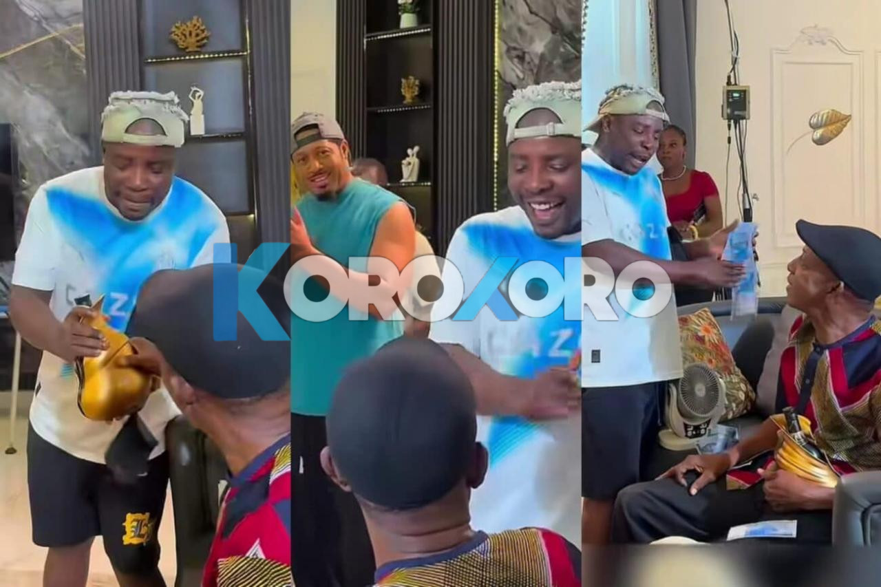 Mr Aloy Showers Nollywood Icon Nkem Owoh With Money and Palm Wine on Movie Set – Fans in Awe
