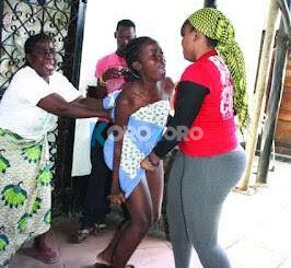 Wife Returns From Night Vigil, Finds Another Woman in Her Bed With Husband And Made Her Go Naked in Port Harcourt (WATCH VIDEO)